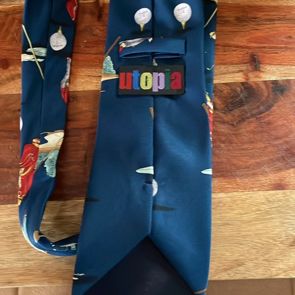 Utopia Men’s golf tie. Golf print. Navy tie. Rayon. Like new. 58”.